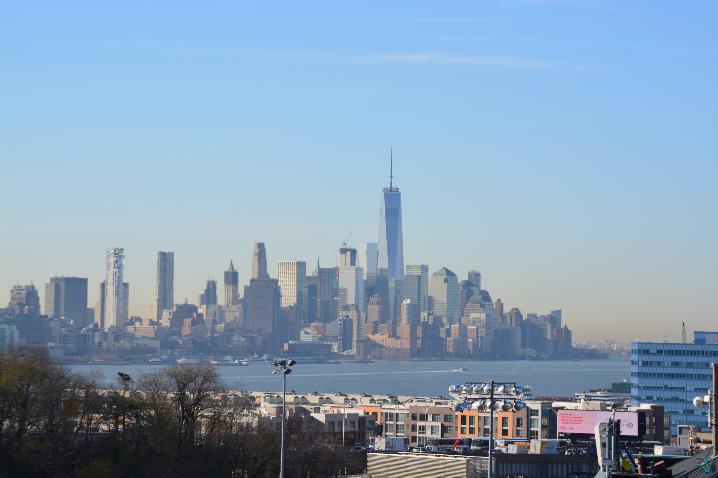 Lower Manhattan skyline viewed across the Hudson River from New Jersey on a clear morning
